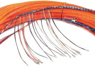The individually colour-coded, shielded pair leads of the probe connection cable
